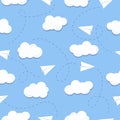 Seamless pattern with paper plane and clouds on blue background
