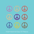 Vector illustration international day of peace colorful concept with peace symbols with patterns isolated on light blue background
