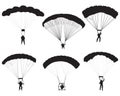 Black silhouettes of paratroopers