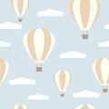 Seamless pattern with hot air balloons and clouds. Vector illustration. Royalty Free Stock Photo