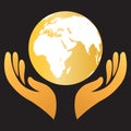 Gold earth globe world save caring hands global company business industries logo vector design on black background. Royalty Free Stock Photo