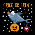 Trick or treat - funny cartoon shark with pumpkin bag , and candy corn. Royalty Free Stock Photo