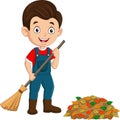 Cartoon boy gardener raking leaves Royalty Free Stock Photo