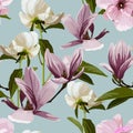 Seamless floral pattern with violet tropical magnolia, peony flowers with leaves on blue background. Royalty Free Stock Photo