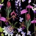 Violet tropical flower seamless pattern, buds and leaves on black background.