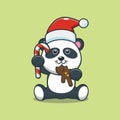 Cute panda eating christmas cookies and candy Royalty Free Stock Photo