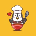 Cute penguin chef with a bowl of soup