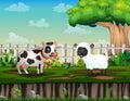 Cartoon a cow and sheep in the green land