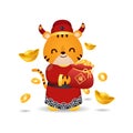Cute tiger in Chinese costume holding a bag of gold coin as symbol of prosperity Royalty Free Stock Photo