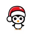 Cute penguin animal cartoon character celebrating christmas wearing christmas hat