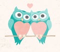A pair of loving owls