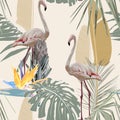 Flamingo on a vintage yellow background, jungle. Seamless pattern with flamingos and tropical plants and flowers. Royalty Free Stock Photo