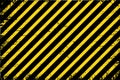 Yellow warning stripe background with abstract grunge. Royalty Free Stock Photo