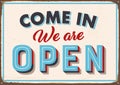 Come in we are open vintage style rusty metal sign. Royalty Free Stock Photo
