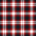 Red, navy blue and white tartan plaid. Scottish pattern fabric swatch close-up. Royalty Free Stock Photo