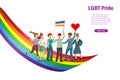 Diverse people parade with LGBT rainbow flag celebrate LGBTQ pride month holding flag and heart sign. To support transgender commu