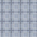 Blue and black houndstooth plaid pattern fabric sweatch.
