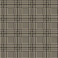 Beige and black houndstooth plaid pattern fabric swatch.