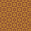 Geometric flowers on checkerboard seamless pattern in orange and brown