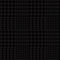 Black houndstooth pattern fabric swatch.