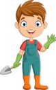 Cute little gardener holding a shovel