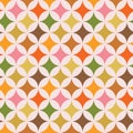 Mid century modern colorful starburst on white circles seamless pattern.