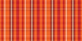 Tartan plaid pattern for autumn winter in navy blue, orange, red, yellow, beige. Seamless multicolored small check pattern Royalty Free Stock Photo