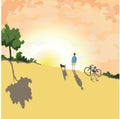 a guy with a dog and a bike watch the sunset Royalty Free Stock Photo