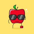 cute red apple character with smile expression, black eyeglasses, one leg raised and one hand holding glasses Royalty Free Stock Photo
