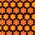 Cute retro 70s groovy hippie flowers seamless pattern in orange, yellow and red over dark background. Royalty Free Stock Photo