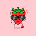 cute strawberry character with smile expression, black glasses, one leg raised and one hand holding glasses Royalty Free Stock Photo