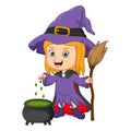 Cute little witch cooking a potion in cauldron Royalty Free Stock Photo