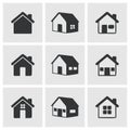 9 Symbols or icons of houses, stores, buildings isolated on black.