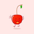 cute cherry cartoon character with smile and happy expression. jump, close eyes and mouth open Royalty Free Stock Photo
