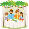 Holiday of Sukkot - family in the Sukkah