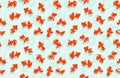 Goldfish. Pattern texture repeating seamless. Colored bright aquarium fish on a blue background. Fish sketch collection.