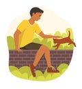 Teenager Boy and Cat Living in Garden Royalty Free Stock Photo