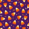 Candy corn seamless pattern isolated on purple backgound