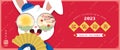 2023 Lunar New year, cartoon rabbit holding chinese fan.