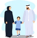Traditional Emirati young family enjoying the weekend outdoor with kid.