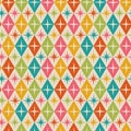 Mid century modern atomic starburst on retro diamond shapes seamless pattern in teal, green, orange, pink and yellow.