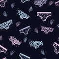 Seamless doodle panties pattern on a black background. multicolored women\'s panties Royalty Free Stock Photo