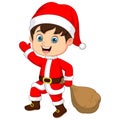 Cartoon little boy wear santa costume carrying a sack Royalty Free Stock Photo