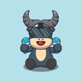 Cute buffalo playing virtual reality. Royalty Free Stock Photo