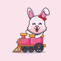 Cute bunny mascot cartoon character ride on train.
