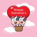 Cute cow cartoon character fly with air balloon in valentine\'s day. Royalty Free Stock Photo