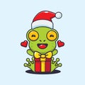 Cute frog happy with christmas gift. Cute christmas cartoon character illustration.