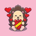 Cute hedgehog happy with love gift in valentine\'s day.