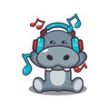 Cute hippo listening music with headphone cartoon vector illustration. Royalty Free Stock Photo