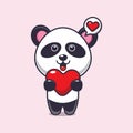 Cute panda cartoon character holding love heart at valentine\'s day. Royalty Free Stock Photo